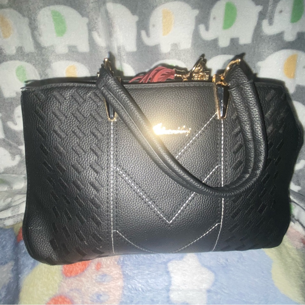 Black Quilted Shoulder Bag with Gold Accents